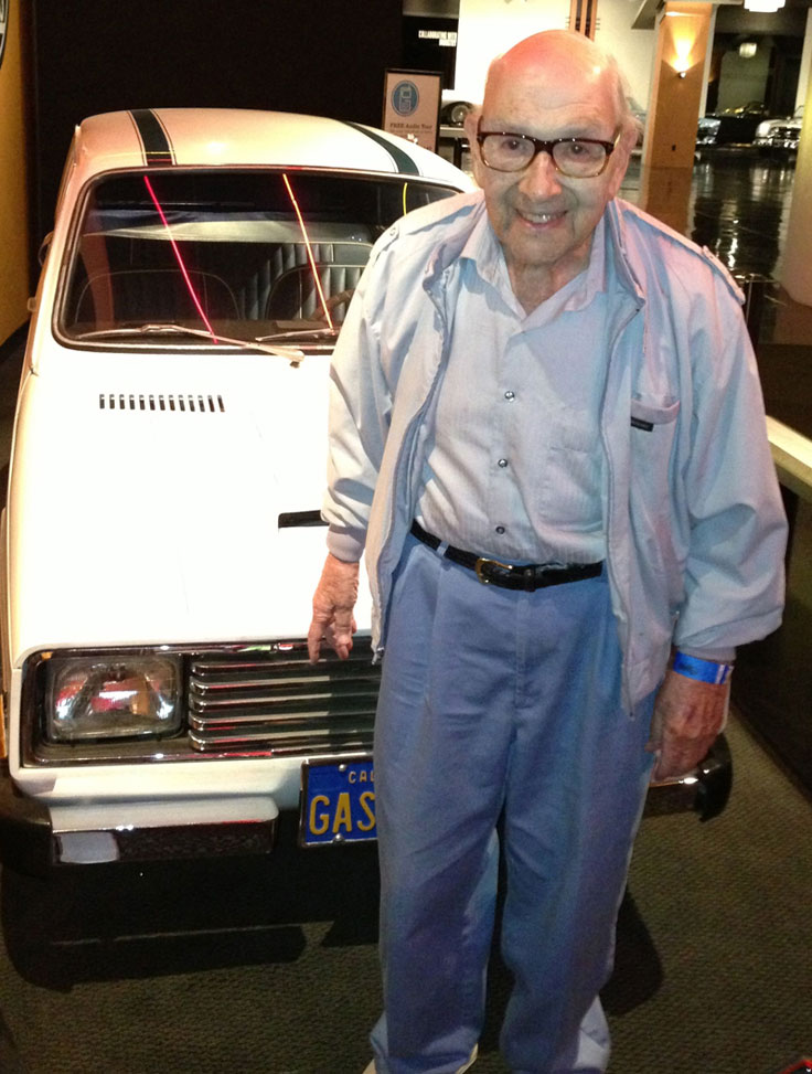 Robert G. Metzner with his hybrid automobile